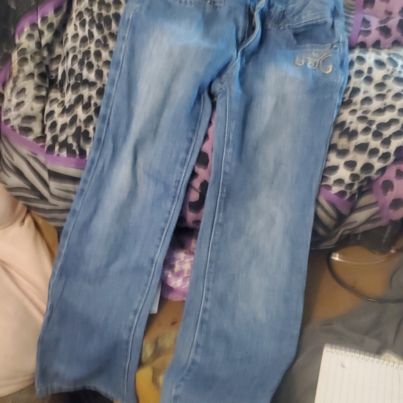 Blue jeans 👖with silver trim around the pockets - Picture 2 of 3